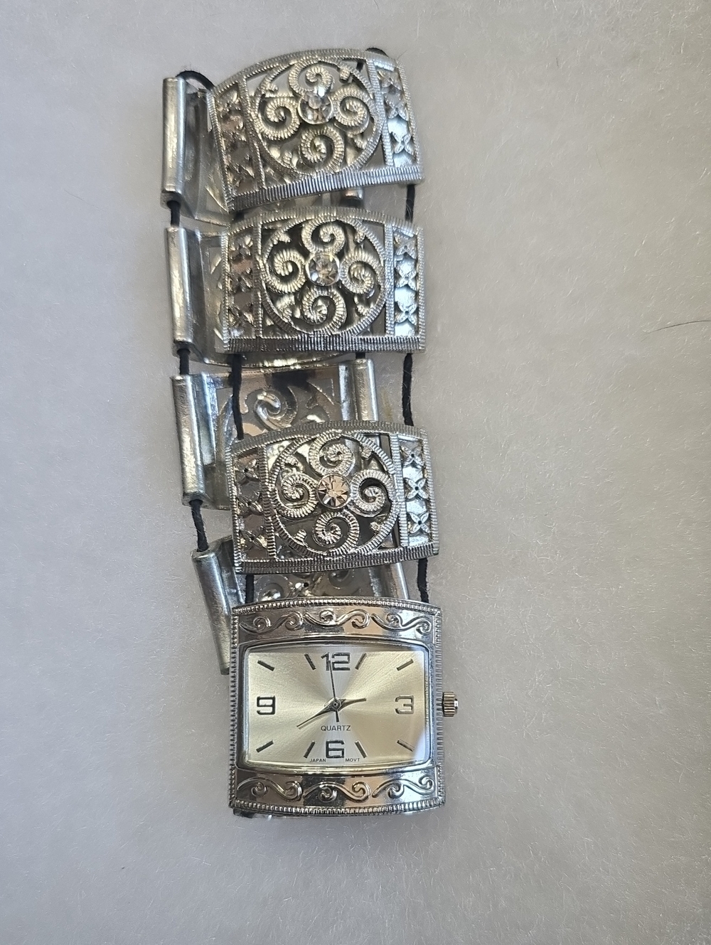 Silvertone Filigree Women's Quartz Bracelet Watch